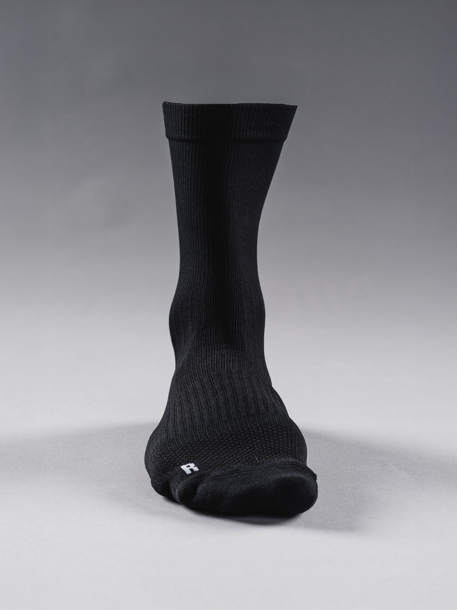 Fusion running sock in black with left and right specific socks for better fit and comfort