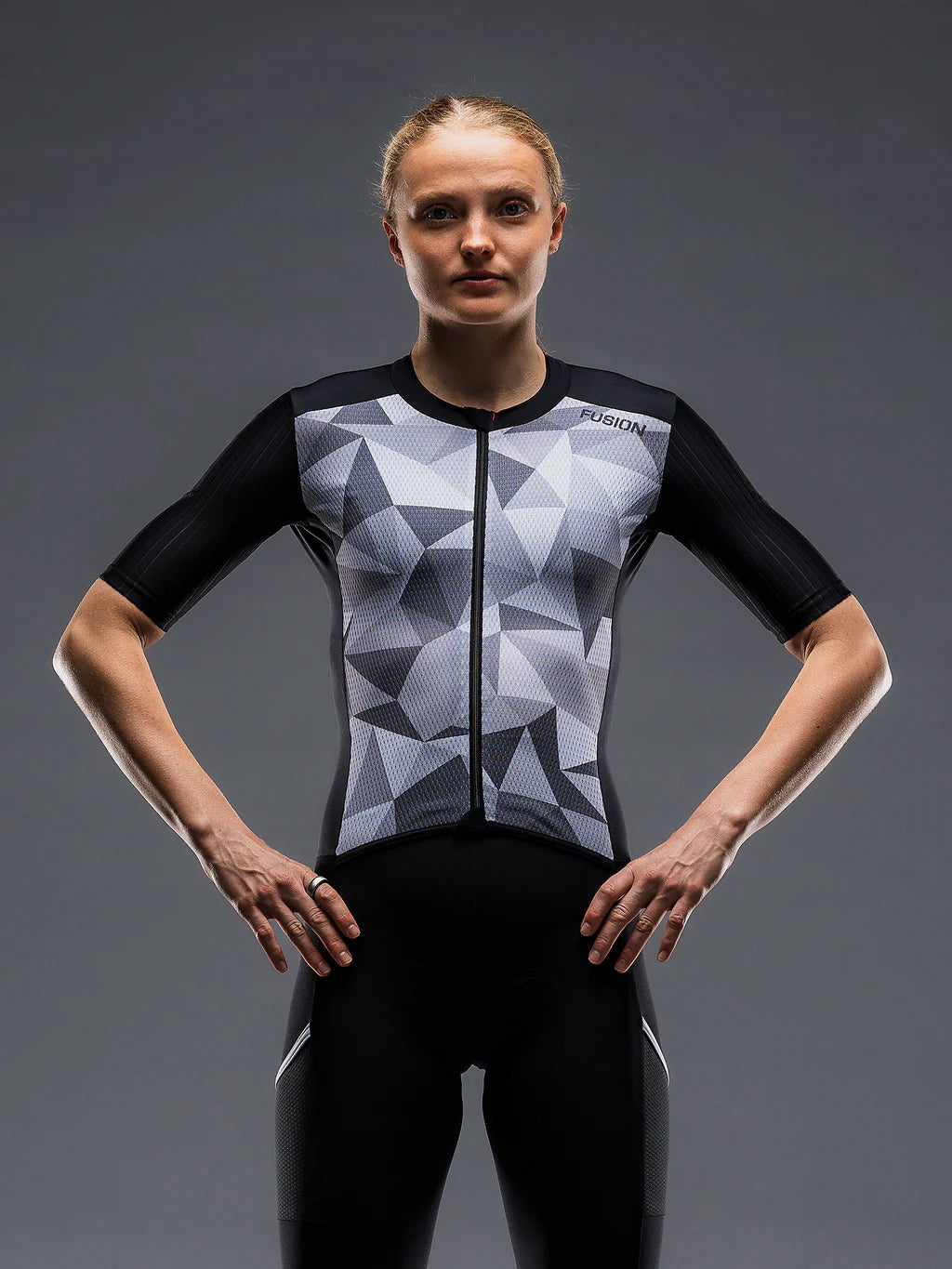 Fusion Tempo! Two in black on female athelte, suit moulds to body shape