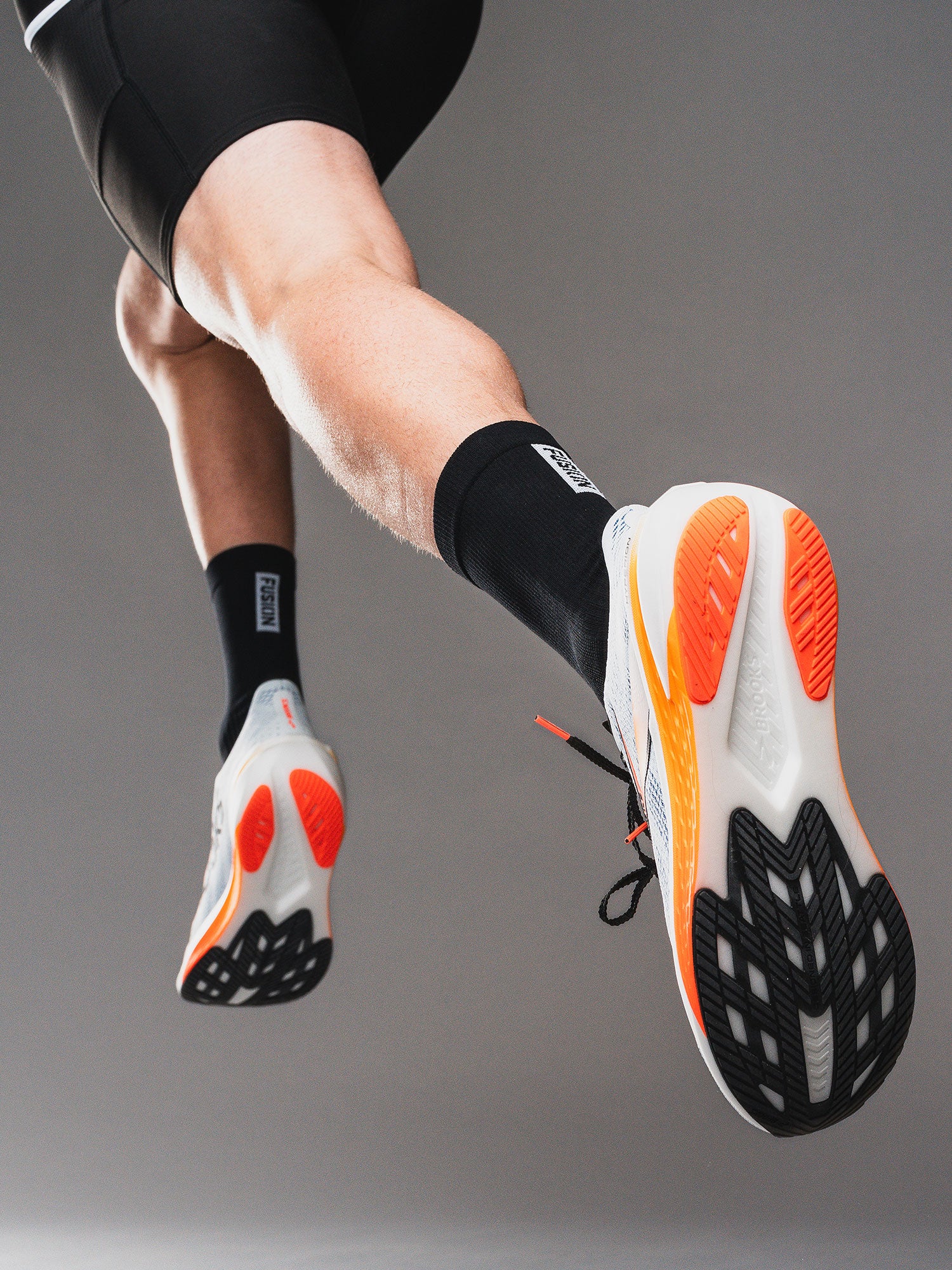 Fusion running sock in black with Fusion logo 